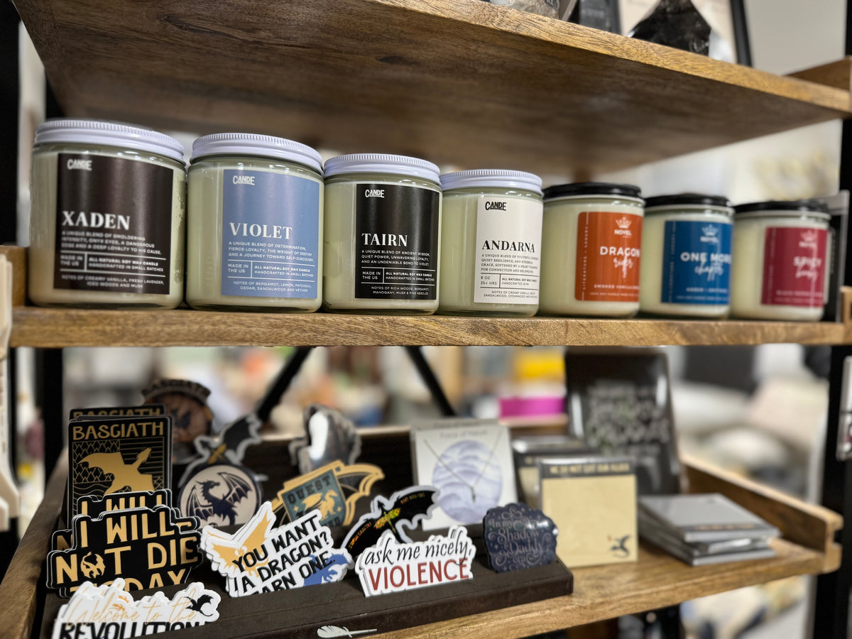 Shelf of Fourth Wing Inspired Candles and Stickers. Xaden, Violet, Tairn, Andarna, Dragon Rider. Ask me nicely Violence sticker.