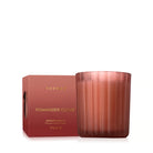 Thymes Pomander Clove candle with packaging on a white background